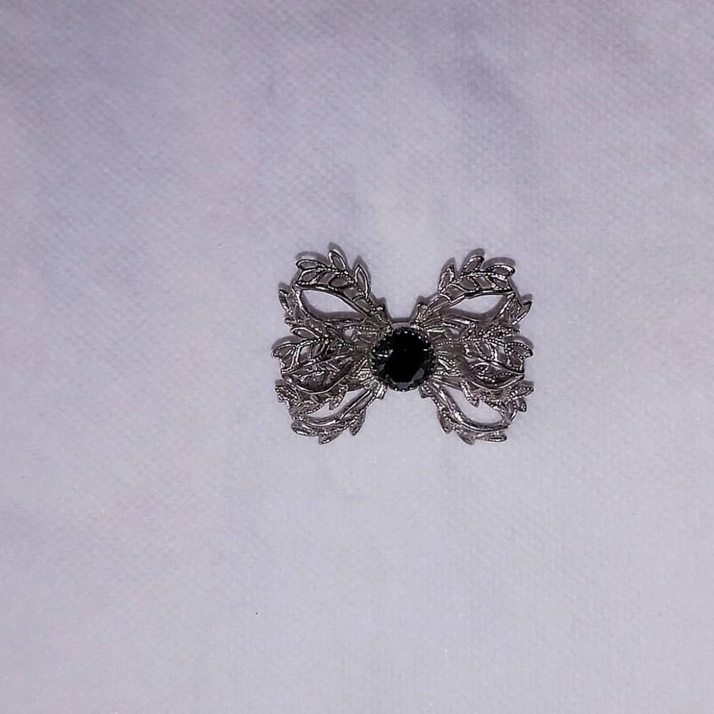 Vintage sterling silver black onyx brooch.